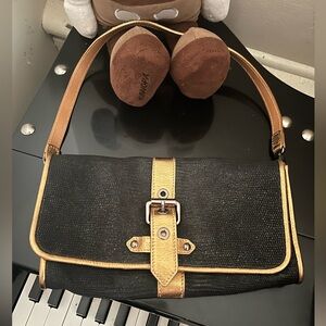 LONG CHAMP. Black and gold.